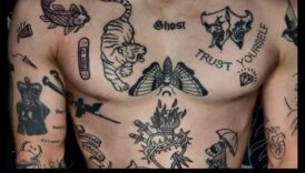 דיו מטפורי: כרוניקות מעוצבות באמנות גוף סמלית